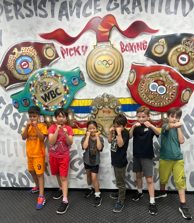Kids at Picky Boxing mural